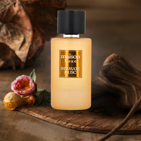 Maison Luxe Intimate Musc Eau de Parfum by Hamidi in a 110ml spray, displayed with a velvet pouch, showcasing elegant packaging.