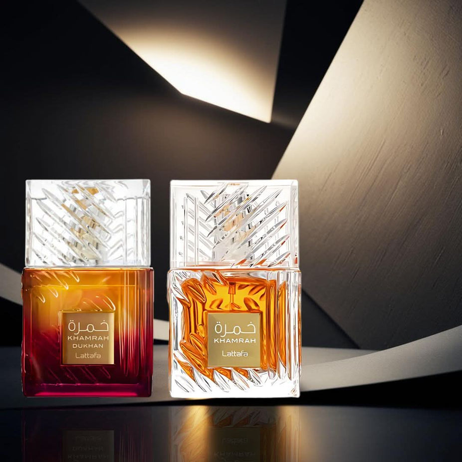 Lattafa Khamrah & Dukhan Eau de Parfum bundle, 100ml each, showcasing elegant perfume bottles with intricate designs.