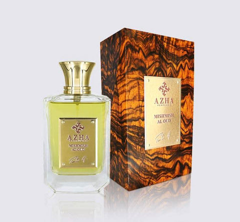 Bottle of Mishmish Al Oud Eau De Parfum by Azha, 100ml, with the elegant fragrance bottle and cap visible.