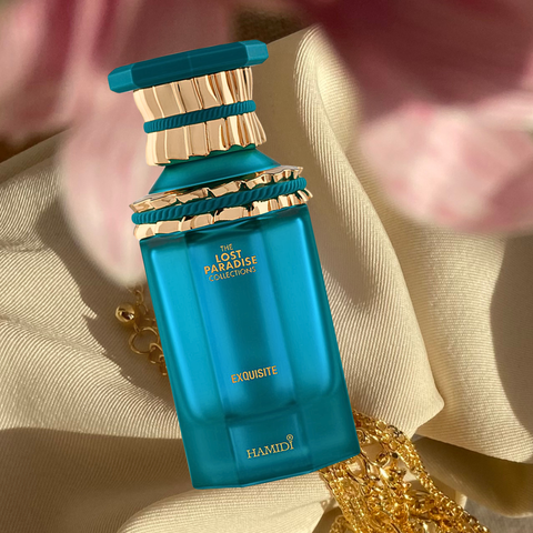 Hamidi Exquisite Eau de Parfum spray 100ml in a velvet pouch, featuring a sleek glass bottle with a stylish cap.