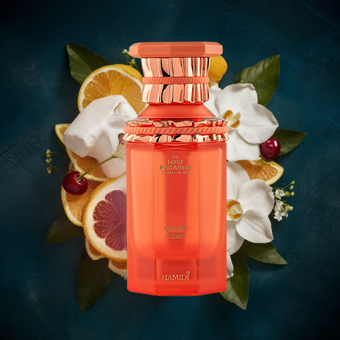 Hamidi Sublime Cherry Eau de Parfum spray in 100ml with velvet pouch, featuring a sleek bottle design and cherry-inspired fragrance.