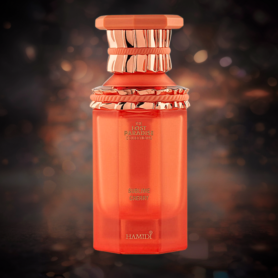 Hamidi Sublime Cherry Eau de Parfum spray in 100ml bottle, displayed with a velvet pouch, showcasing the elegant packaging.