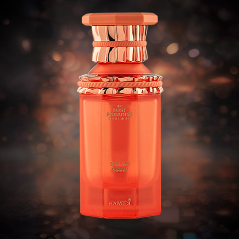 Hamidi Sublime Cherry Eau de Parfum spray in 100ml bottle, displayed with a velvet pouch, showcasing the elegant packaging.