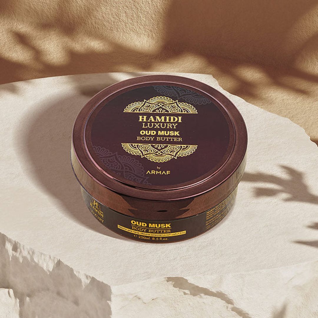 Hamidi Luxury Oud Musk Body Butter 250ml jar with creamy texture and elegant packaging, emphasizing moisturizing and exotic scent.