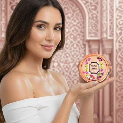 Hamidi Oud Rose Body Scrub 250ml bottle with luxurious pink and gold packaging, showcasing the elegant design of the body scrub product.