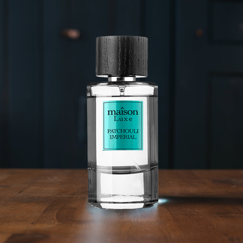 Maison Luxe Patchouli Imperial Eau de Parfum Spray by Hamidi in velvet pouch, featuring warm patchouli scent and elegant packaging.