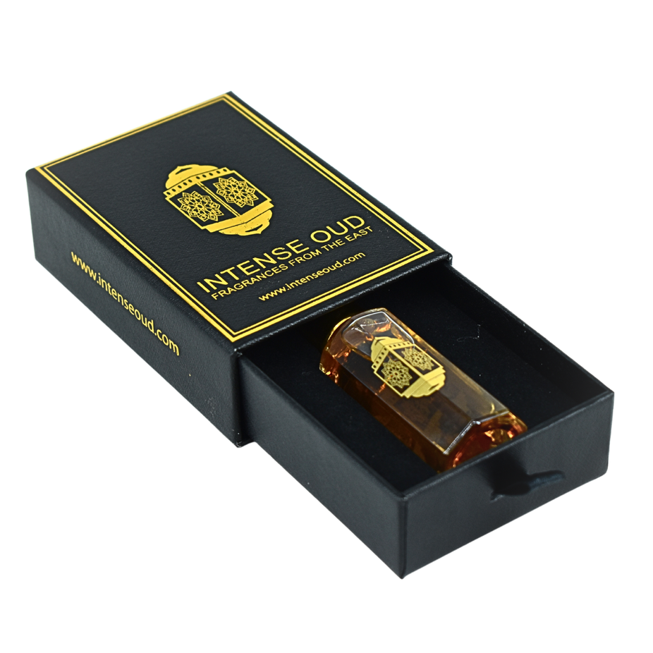 Poison Girl perfume oil for women in a 12ml clear bottle with black gift box, by Intense Oud, showcasing elegant packaging.