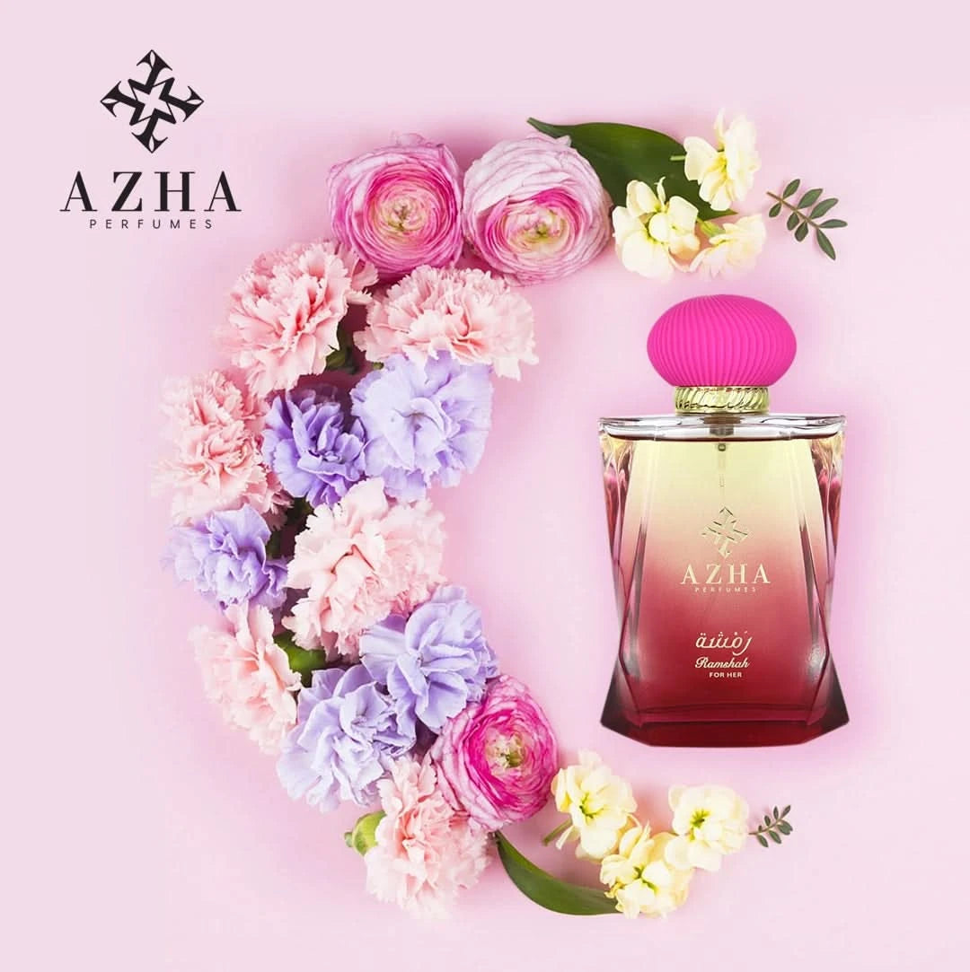 Azha Ramshah For Her Eau de Parfum spray in 100ml emerald-colored bottle, presented in a velvet pouch, elegant perfume packaging.