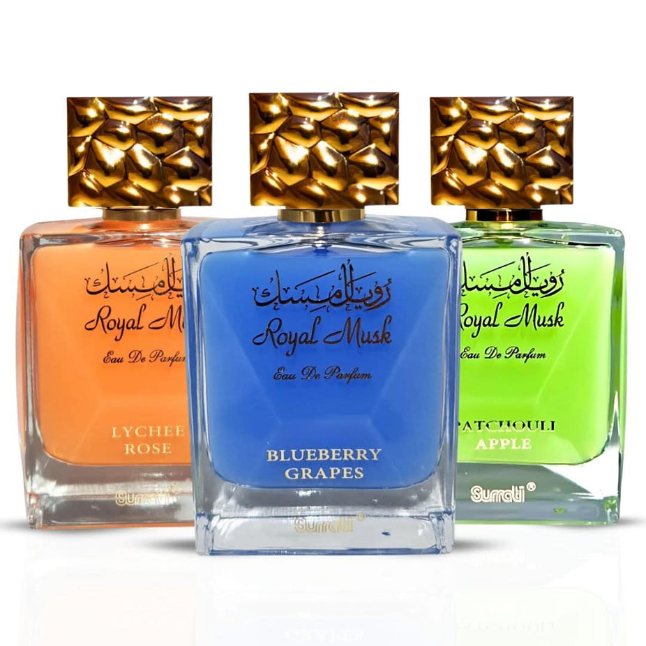 Bundle of three Surrati Royal Musk Blueberry Grapes, Patchouli Apple, and Lychee Rose Eau de Parfum sprays in 100ml bottles.