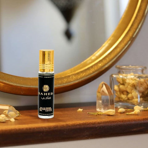 Ard Al Zaafaran Saheb Eau de Parfum spray and roll-on perfume bundle, featuring 70ml spray and 10ml roll-on for men or women