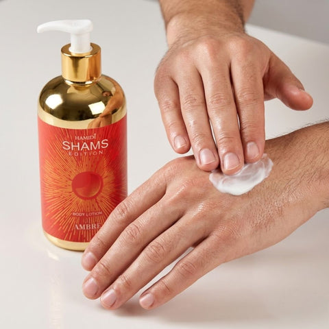 Hamidi Shams Edition Ambre Body Lotion 500ml bottle showing the moisturizing lotion with amber-colored liquid and elegant packaging.