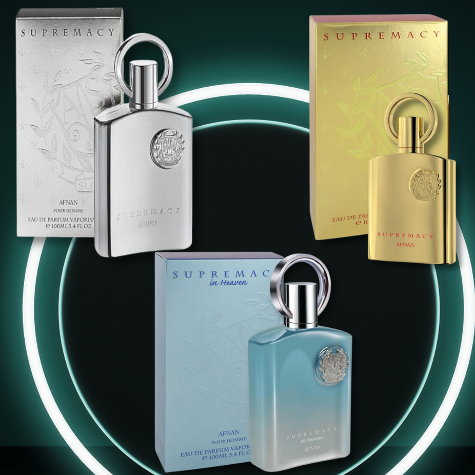 A bundle of Afnan Supremacy Gold, Silver, and Heaven Eau de Parfum sprays in 100ml bottles, with sleek perfume packaging.