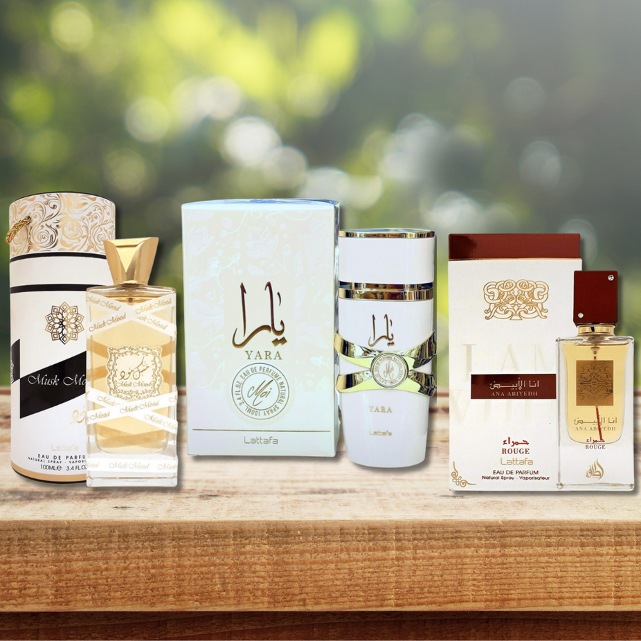 Lattafa Yara Moi Musk Mood EDP and Ana Abiyedh Rouge EDP bottles, 100ml and 60ml, featuring elegant glass perfume bottles.