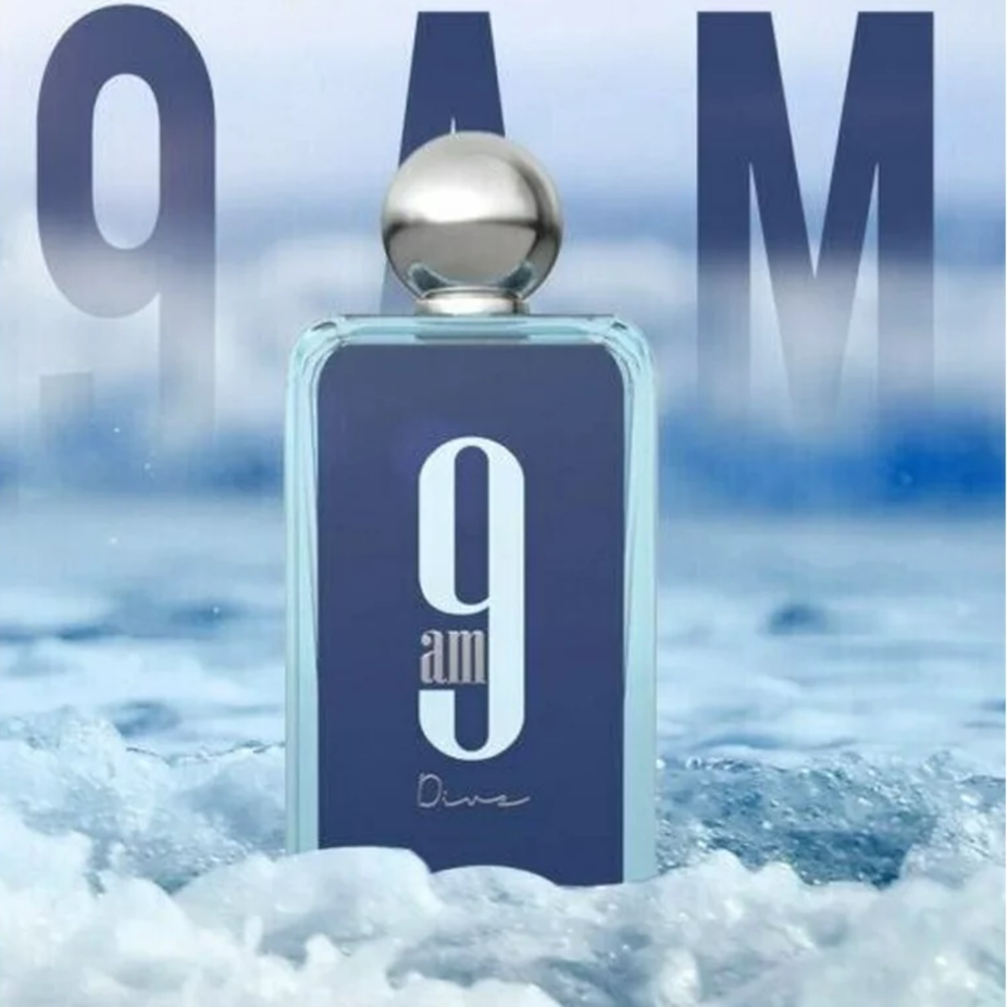Afnan 9AM Dive Eau de Parfum spray 100ml, elegant bottle with a sleek design, showcasing the fragrance for men and women.