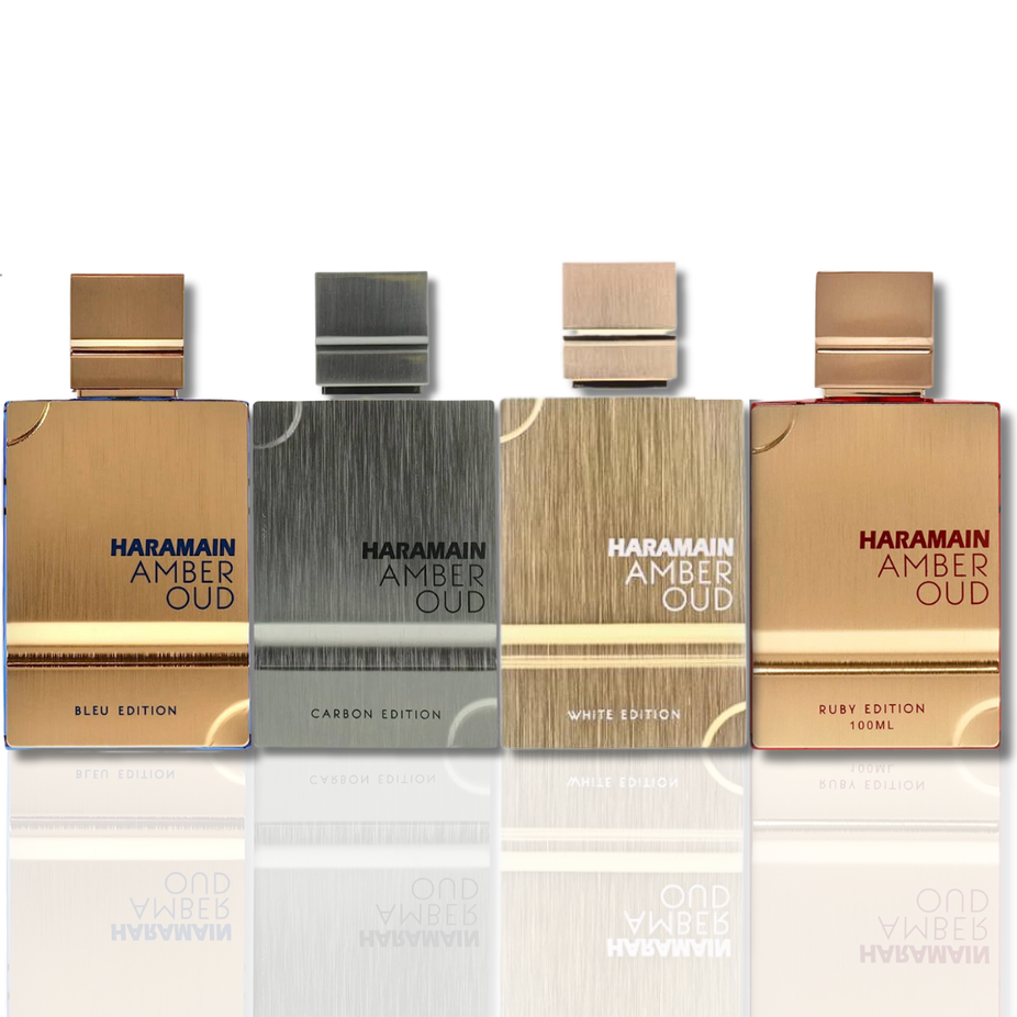 Al Haramain Amber Oud Bleu, Carbon, White, and Ruby Editions Eau De Parfum bottles from the 60ml collection, elegant fragrance display