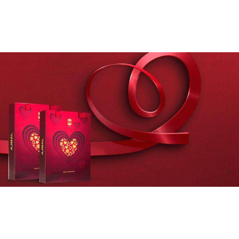 Ajmal Amor Essence for Men perfume gift set with bottles and packaging, featuring elegant design and masculine fragrance branding.