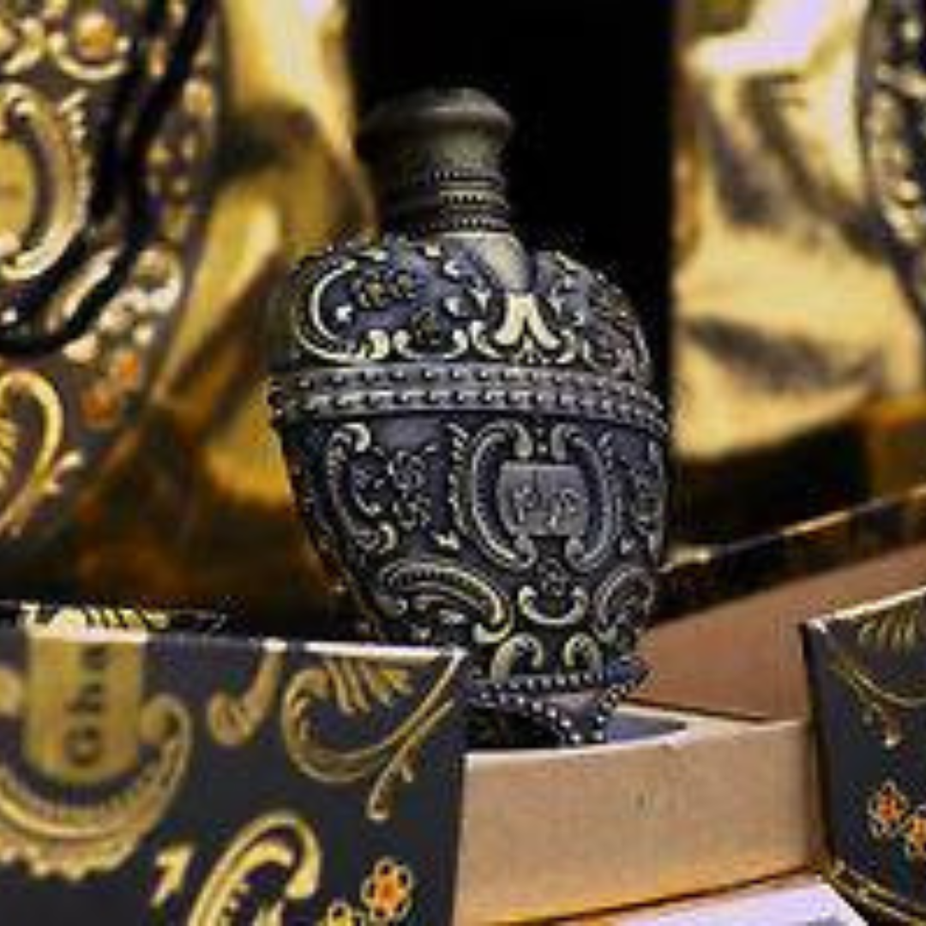 Arabian Oud Gharam Oil 25ML Eau de Parfum bottle with elegant packaging and branding, showcasing the luxurious fragrance.