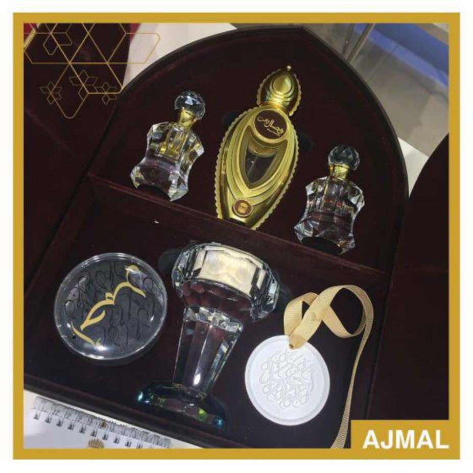 Ajmal Tourist Perfume Gift Set with multiple bottles in elegant packaging, ideal for gifting or personal use.