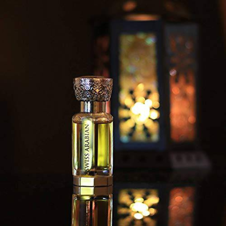Swiss Arabian Amaani Perfume Oil in 12 mL bottle, concentrated perfume oil with elegant packaging and floral scent.