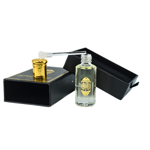 Black Extasy Men perfume oil by Intense Oud in a 12ml bottle with a black gift box, featuring a sleek loose oil design.