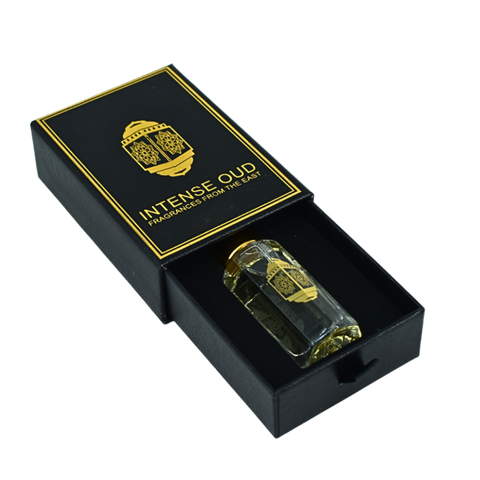 Black Extasy Men perfume oil by Intense Oud in 12ml bottle with black gift box, showcasing the luxurious loose oil product.