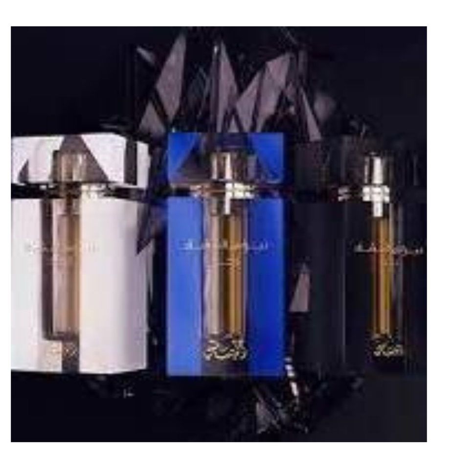 Rasasi Nebras Al Ishq CPO 3-piece concentrated perfume oil set, featuring elegant bottles with intricate gold accents.