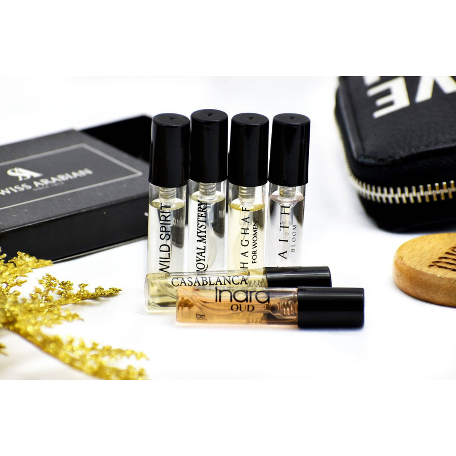 Assorted Swiss Arabian fragrance samples including Royal Mystery, Inara, Faith Bloom, Casablanca, Shaghaf W, and Wild Spirit fragrances.