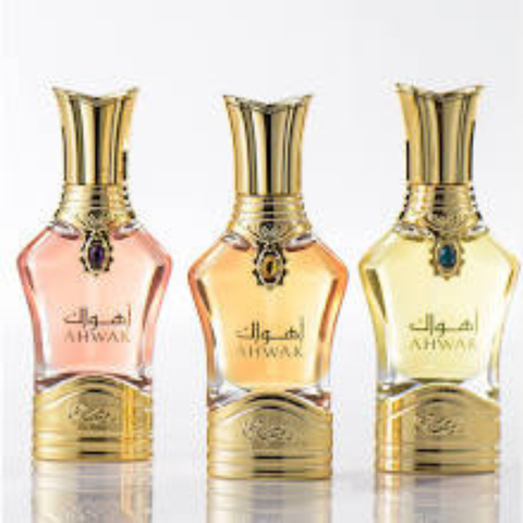 Rasasi Ahwak Al Asfar perfume oil 15ML in a pouch, a concentrated perfume oil with warm, oriental fragrance from Intense Oud.