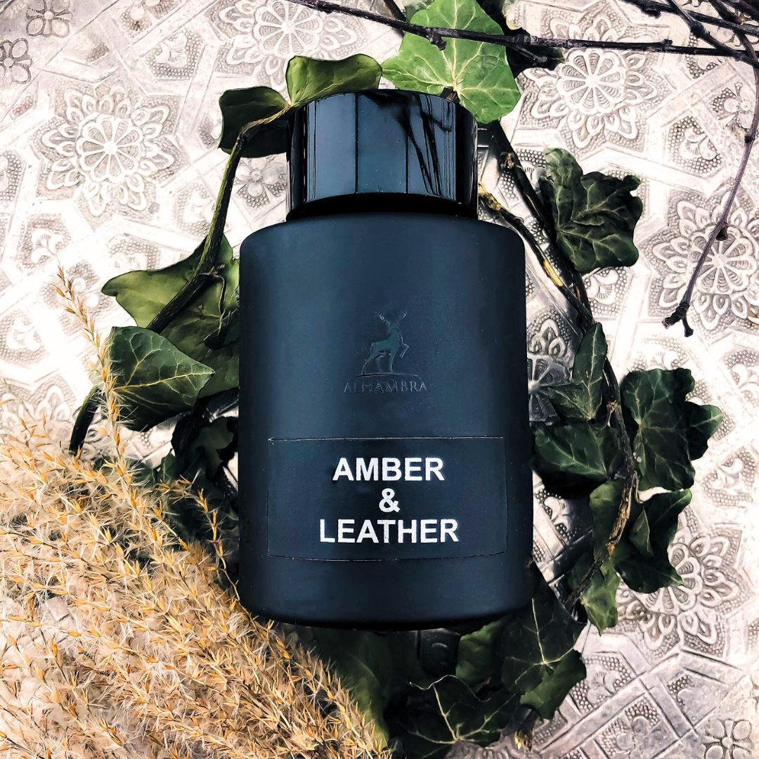 Maison Alhambra Eau de Parfum spray set featuring Rose Petals 80ml and Amber & Leather 100ml bottles.