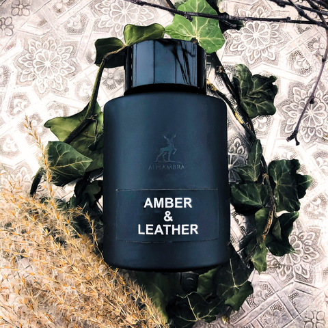 Maison Alhambra Eau de Parfum spray set featuring Rose Petals 80ml and Amber & Leather 100ml bottles.