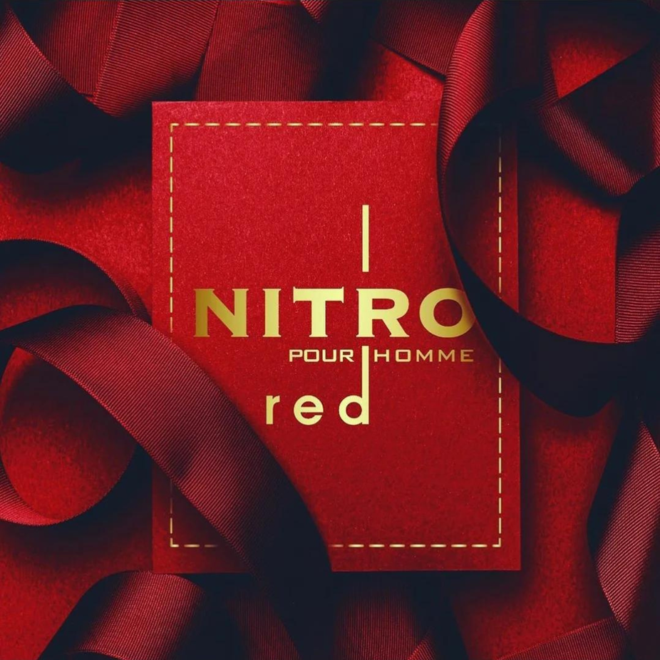 Dumont Paris Nitro Red Eau De Parfum 100ml bottle with vibrant red fragrance liquid, featuring floral, fruity, and woody notes.