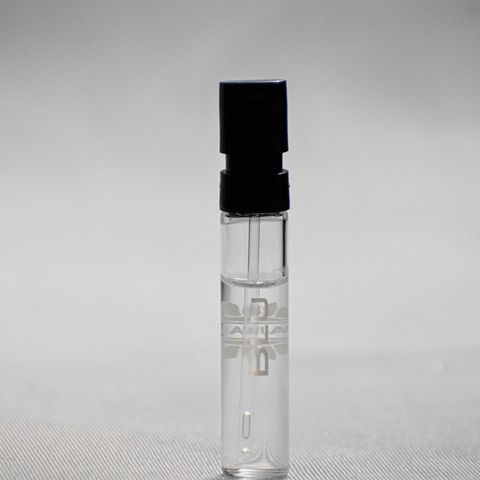Ajmal Blu EDP sample vial for men, 1ML, with label showing product name and branding, small glass perfume sample.