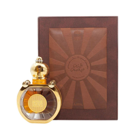 Ajmal Dahn Al Oud Shams Special Edition EDP Unisex 30mL bottle, elegant glass perfume bottle with gold accents.