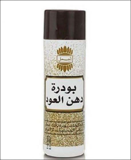 Ajmal Dahn Oudh Powder in a clear container, 35g, showcasing its rich, aromatic fine powder for traditional use.