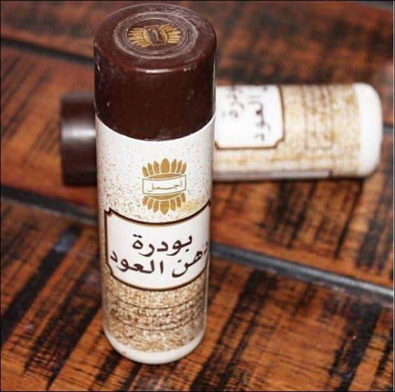 Ajmal Dahn Oudh Powder in a glass jar, 35 GM, showcasing the fragrant powdered oud used in traditional perfumery.