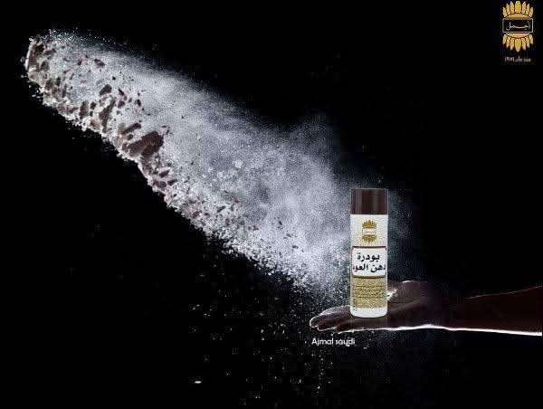 Ajmal Dahn Oudh Powder jar showing 35 GM (1.2 oz) of fragrant oud powder in a clear jar with a label.