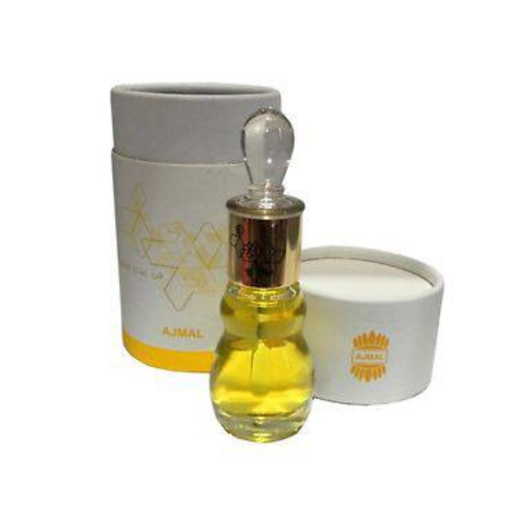 Ajmal Essential Wood Perfume Oil in a 12ml glass bottle with a wooden cap, showcasing the loose oil product.
