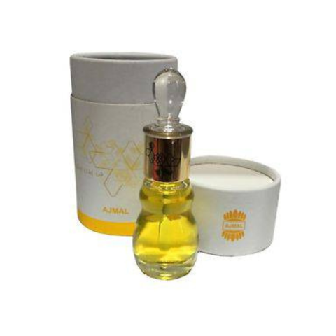 Ajmal Essential Wood Perfume Oil in a 12ml glass bottle with a wooden cap, showcasing the loose oil product.