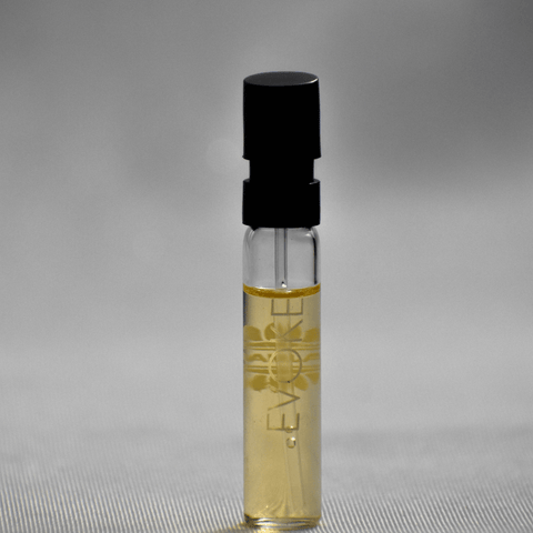 Ajmal Evoke EDP sample vial for women, 1ml, showcasing the clear liquid fragrance in a small glass vial.