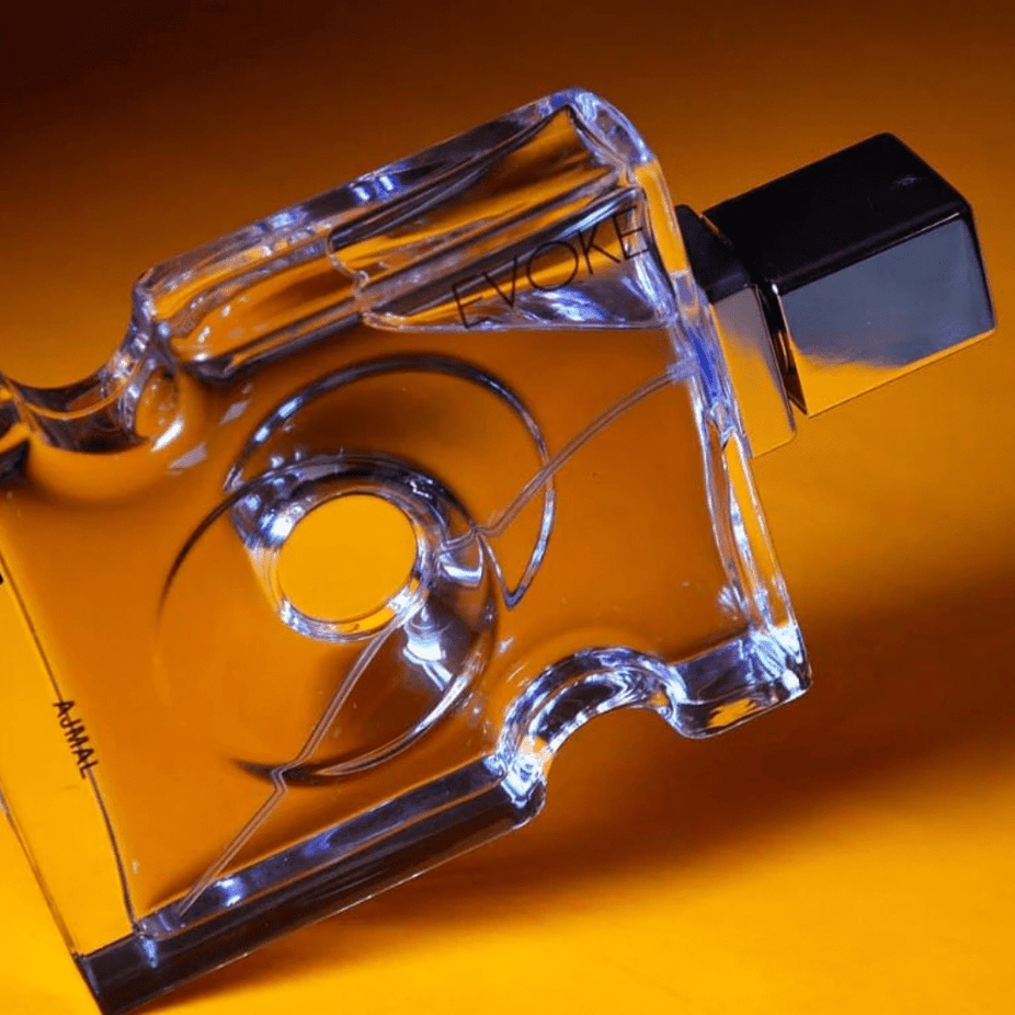 Evoke for Men Ajmal Eau De Parfum 90 ML bottle with sleek packaging and fragrance notes visible in the image.