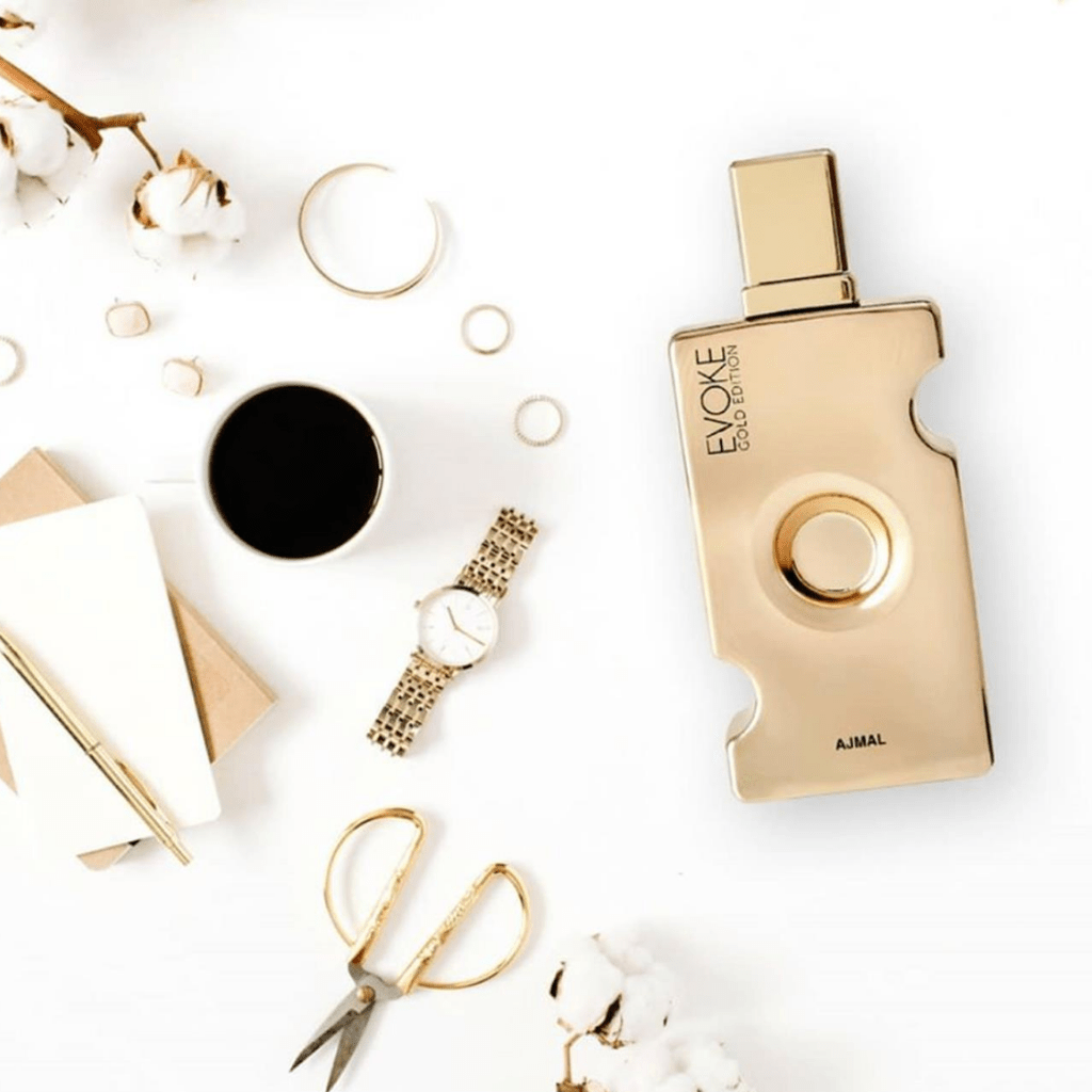 Evoke Gold Edition Eau De Parfum for Women by Ajmal, 75ml bottle, elegant gold packaging and floral fragrance design.