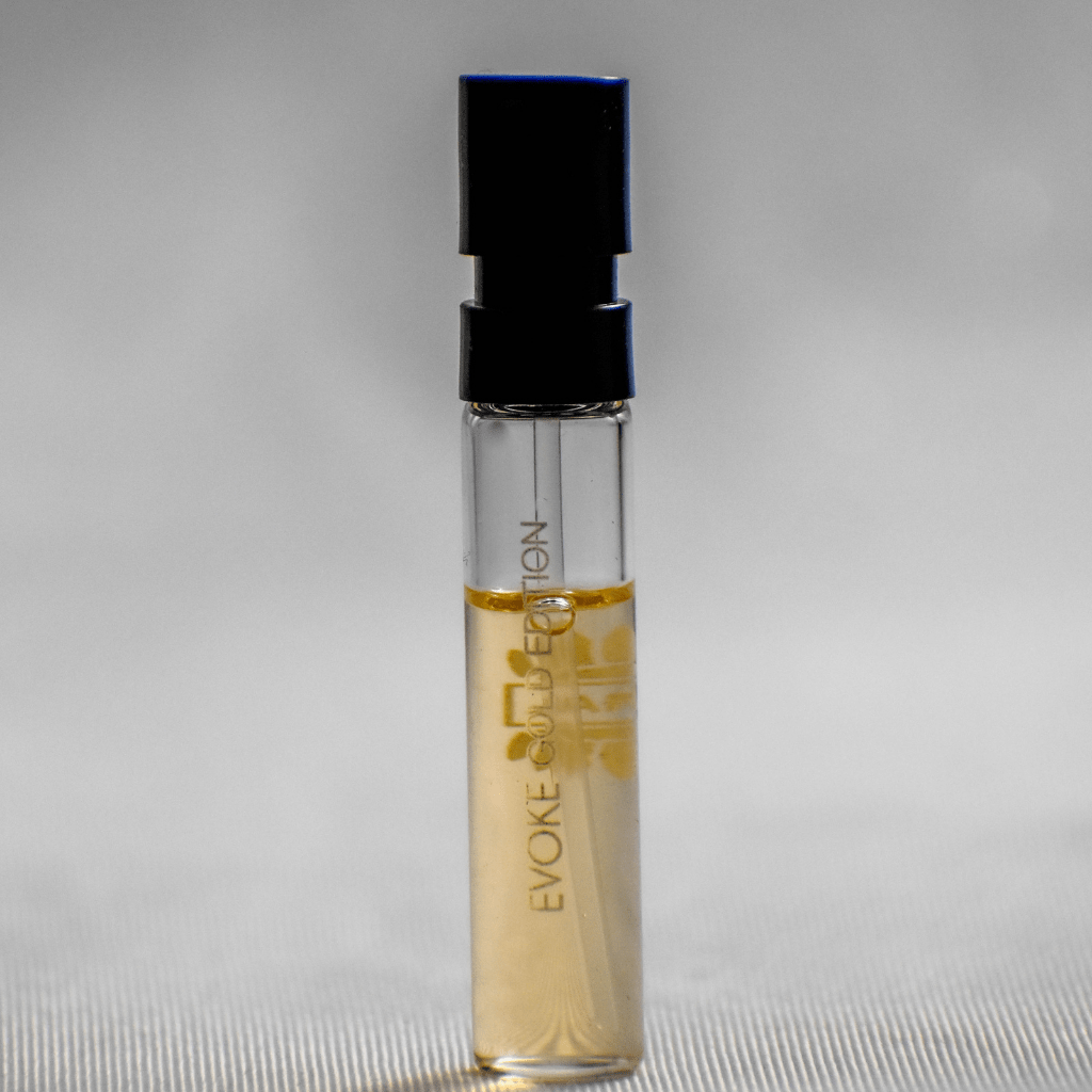 Ajmal Evoke Gold Edition EDP sample for women, 1ML bottle with packaging, showcasing the luxurious fragrance design.