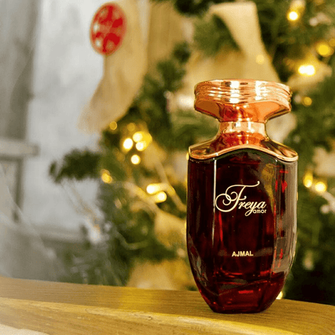 Ajmal Freya Amor Eau De Parfum 100ml glass bottle for women, featuring elegant packaging and floral scent.