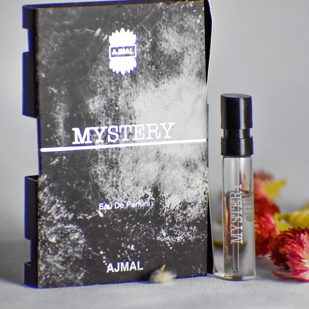 Ajmal Mystery EDP sample for men, 1ml perfume vial with a sleek design, showcasing the 1ML fragrance sample by Ajmal.