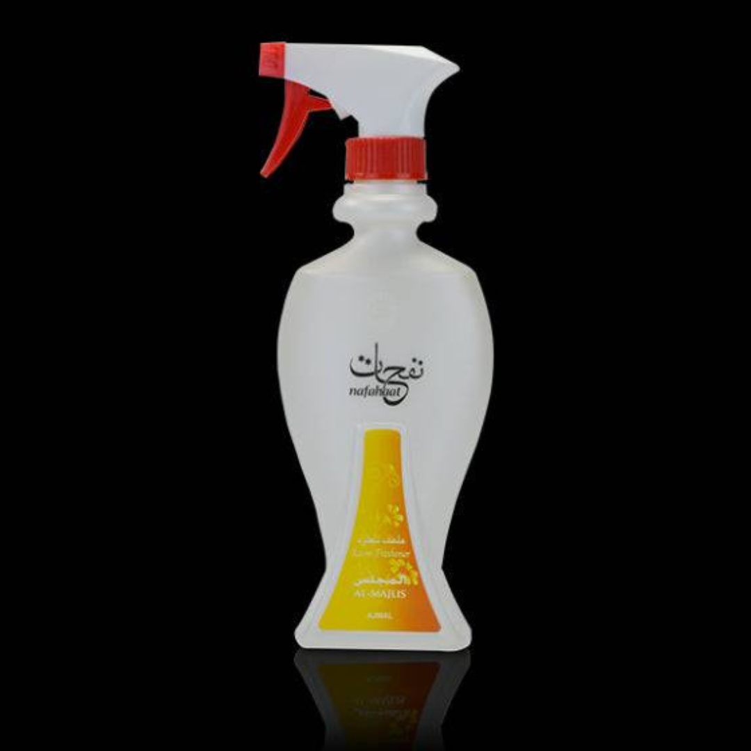 Ajmal Nafahat Al Majlis air freshener 300 ML bottle with label design, showcasing floral and elegant branding.