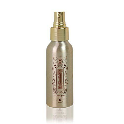 Ajmal Oudh Body Mist 100 ml bottle with packaging, featuring elegant design and fragrance packaging for luxurious scent.