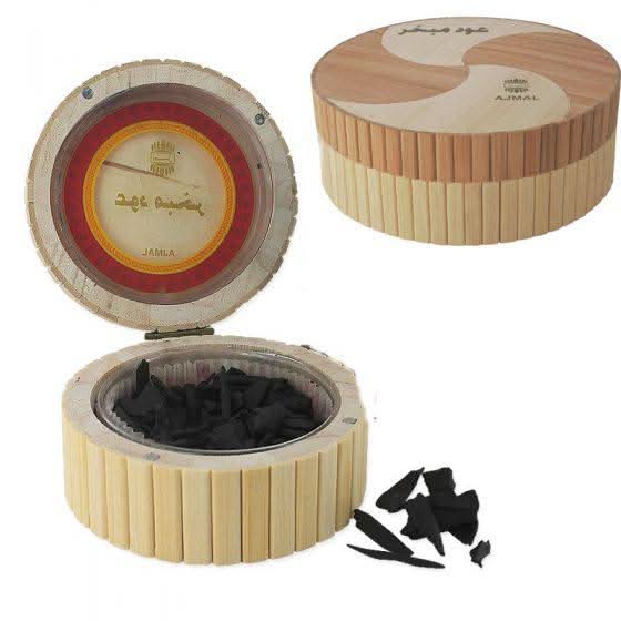 Ajmal Oudh Mubakhar Bakhoor in 25g bamboo box, showcasing traditional aromatic incense for home fragrance.