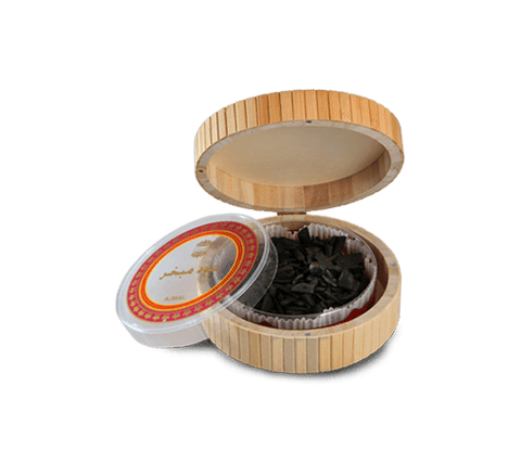 Ajmal Oudh Mubakhar Bakhoor in bamboo box, 100g, traditional aromatic incense with rich, smoky scent for home fragrance.