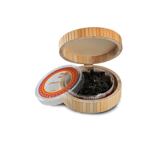 Ajmal Oudh Mubakhar Bakhoor in bamboo box, 50g, with a decorative packaging and lid displaying traditional aroma qualities.