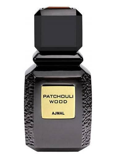Ajmal Patchouli Wood Eau De Parfum 100ml bottle with packaging, featuring a sleek glass design and elegant labeling.